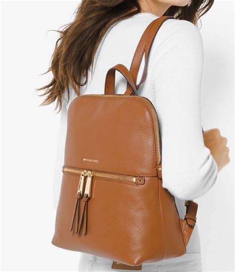 michael kors rhea zip mini backpack|Michael Kors slim backpack purse.